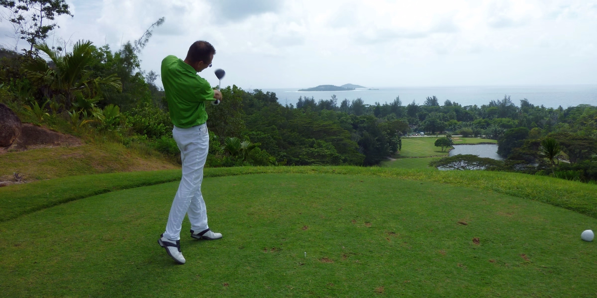 Golf coach during a swing