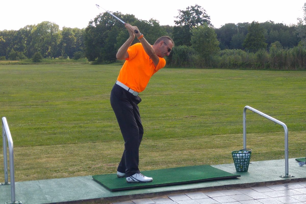 Golf coach Wroclaw after a swing